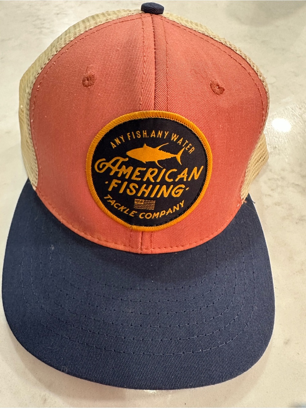 AFCO Fishing and tackle Coral Front Beige Mesh Navy Brim Trucker Hat